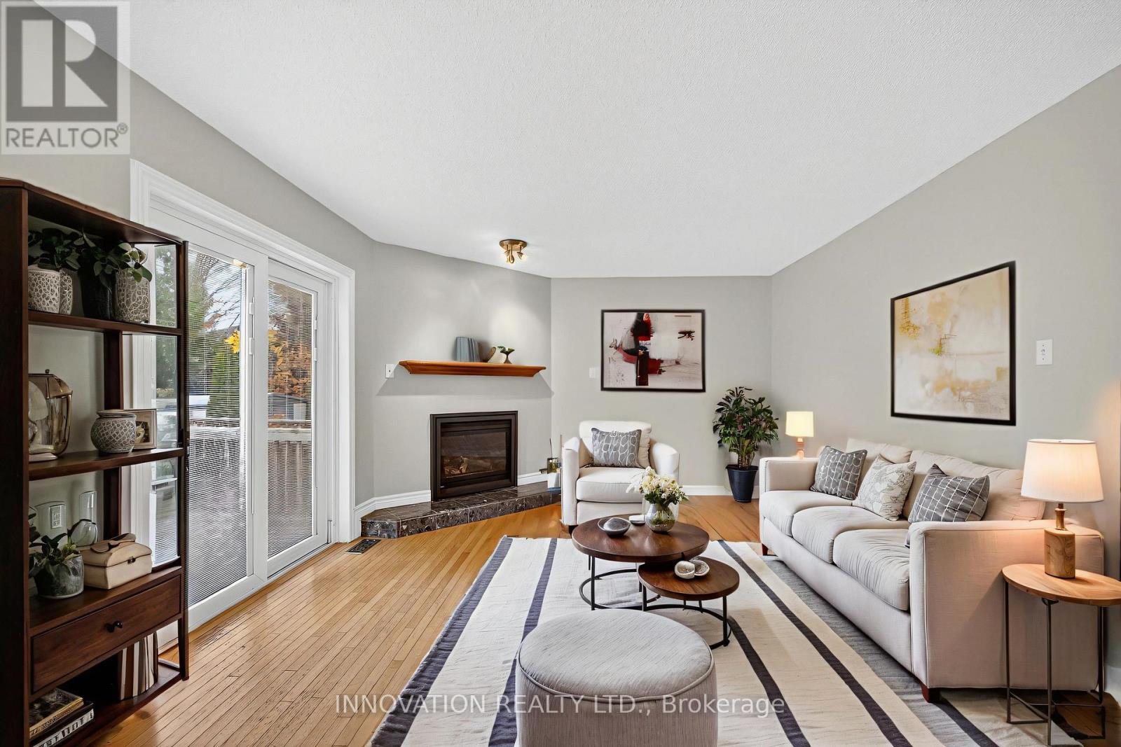 Main floor family room w gas fireplace (2024) - 30 Randall James Drive, Ottawa, ON - Indoor Photo Showing Living Room With Fireplace