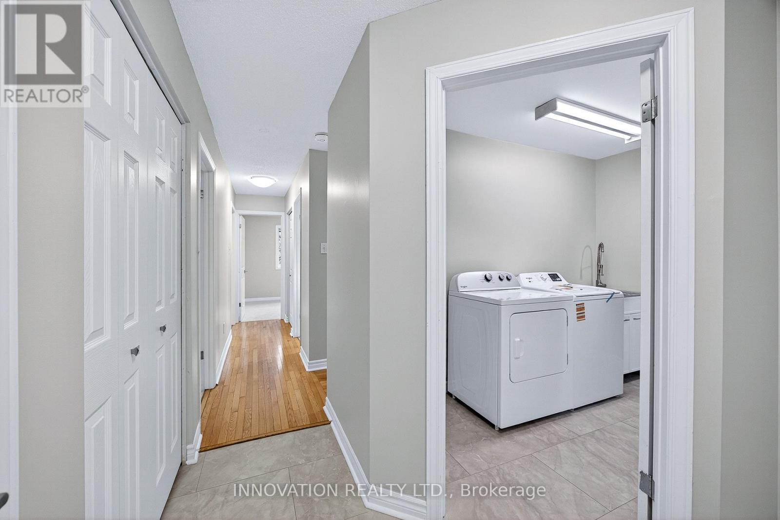 The entire main floor has been freshly painted - 30 Randall James Drive, Ottawa, ON - Indoor Photo Showing Laundry Room