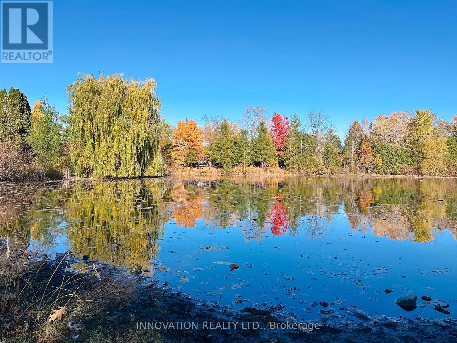 Leading to a central pond! - 30 Randall James Drive, Ottawa, ON - Outdoor With Body Of Water With View