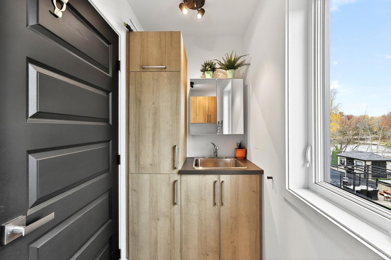 Salle de lavage - 131 Av. Du Littoral, Saint-Paul, QC - Indoor Photo Showing Other Room