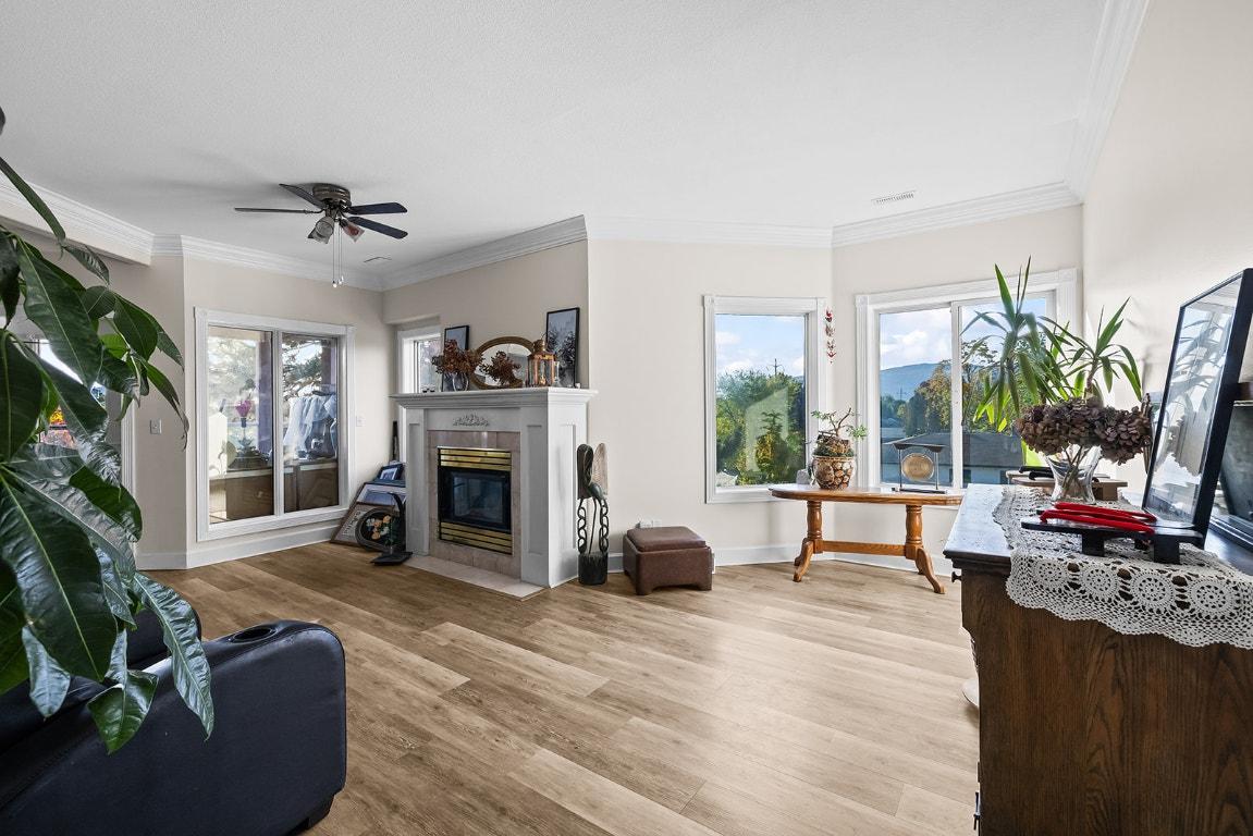 203-1940 Richter Street, Kelowna, BC - Indoor Photo Showing Living Room With Fireplace