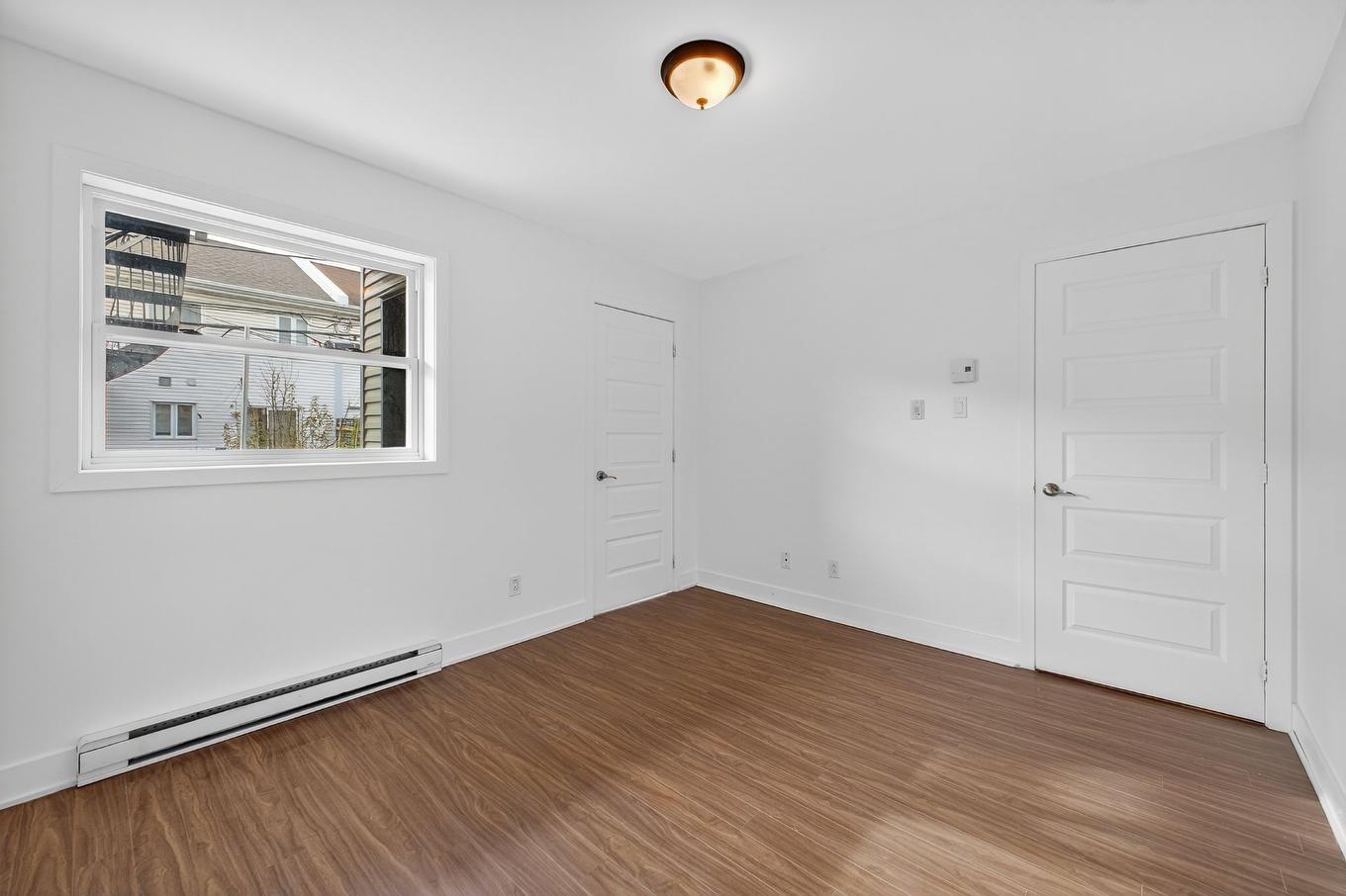 Chambre à coucher - 100-16370 Rue Sherbrooke E., Montréal (Rivière-Des-Prairies/Pointe-Aux-Trembles), QC - Indoor Photo Showing Other Room