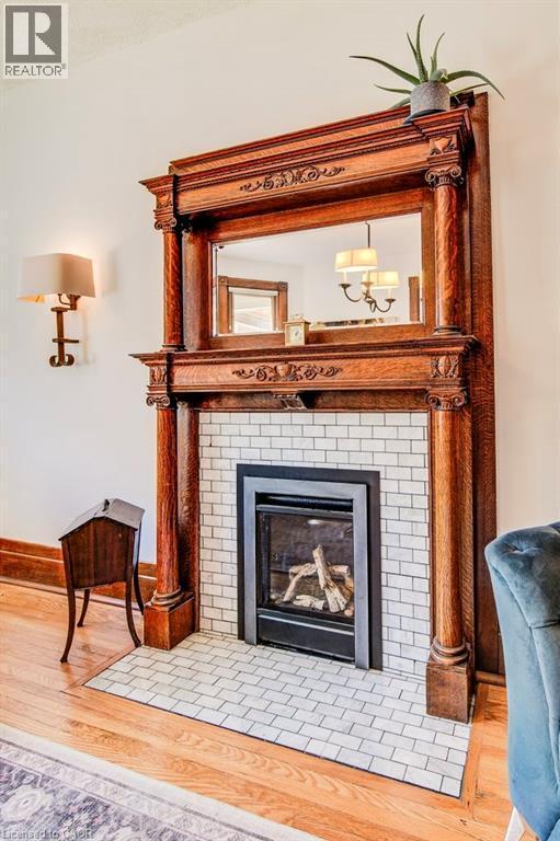 350 Queen Street S, Kitchener, ON - Indoor Photo Showing Living Room With Fireplace