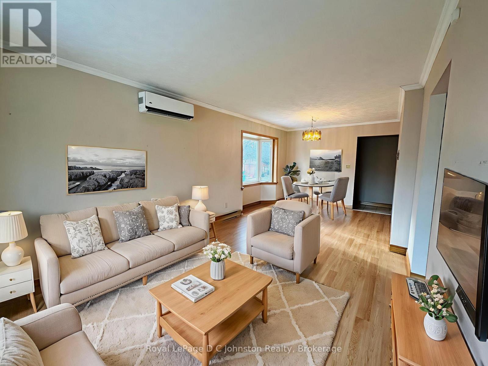 Virtually staged living room - 665 7Th Street E, Owen Sound, ON - Indoor Photo Showing Living Room