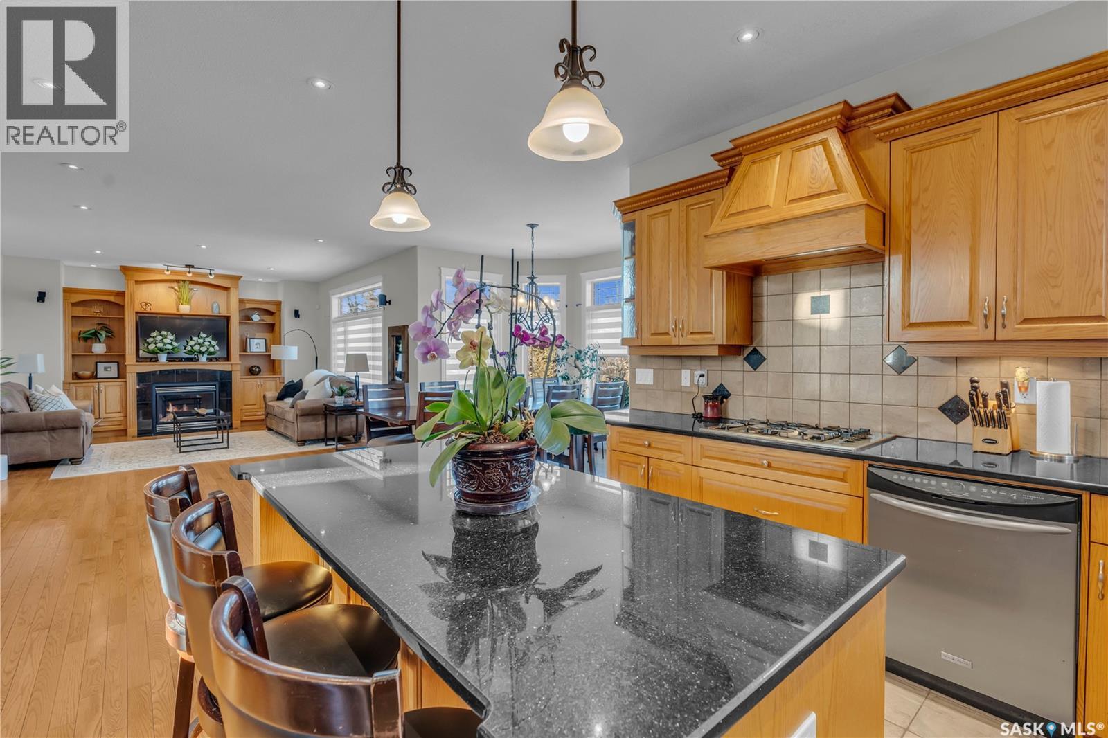 1539 Lakeridge Drive N, Regina, SK - Indoor Photo Showing Kitchen With Fireplace