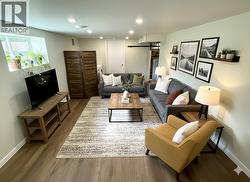 Basement family room digitally staged -