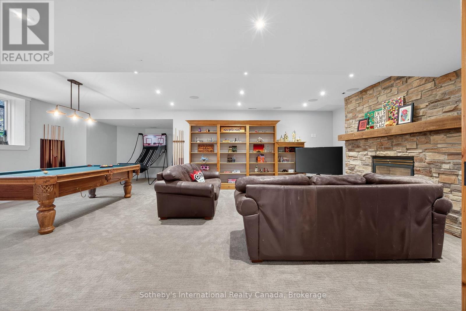 Lower level with walk out - 112 Arrowhead Crescent, Blue Mountains, ON - Indoor Photo Showing Other Room With Fireplace