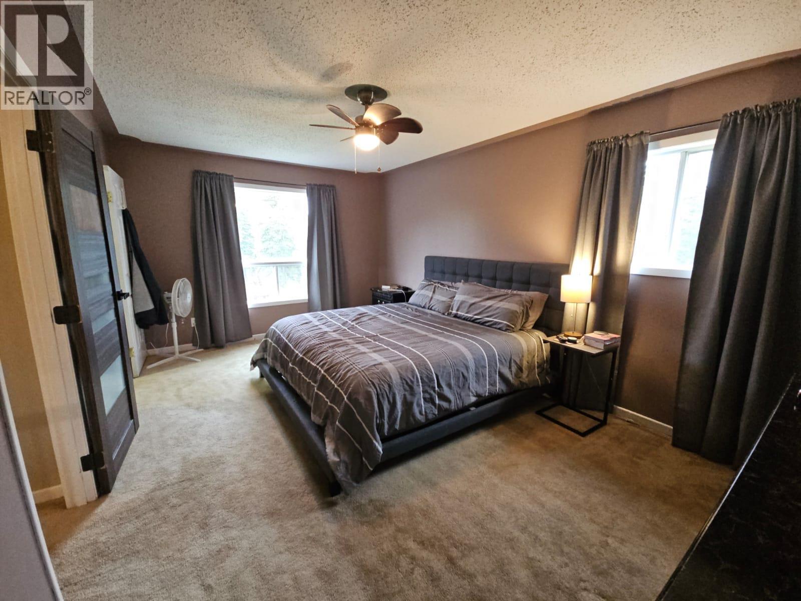 8 Sentinal Place, Tumbler Ridge, BC - Indoor Photo Showing Bedroom