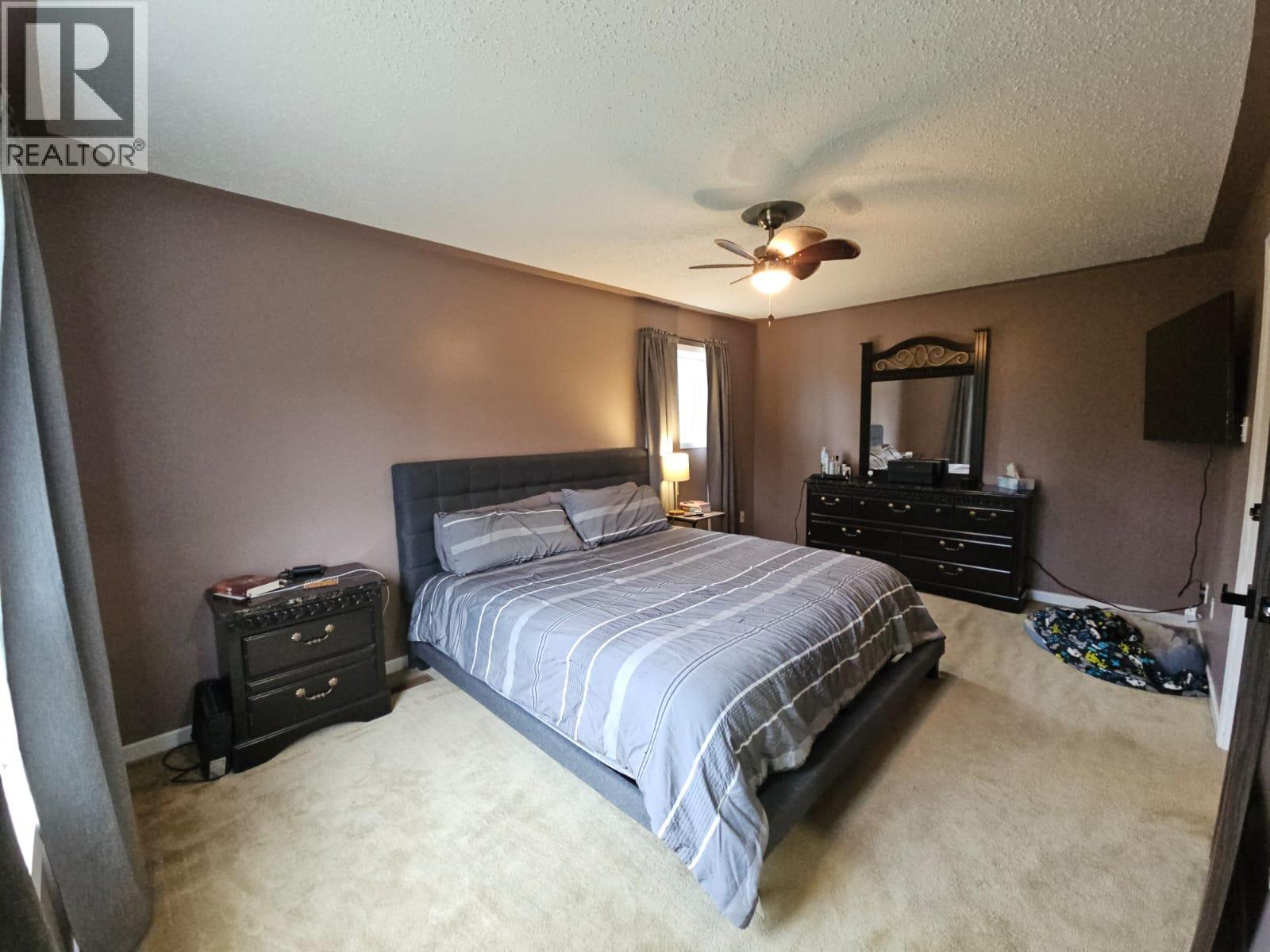 8 Sentinal Place, Tumbler Ridge, BC - Indoor Photo Showing Bedroom