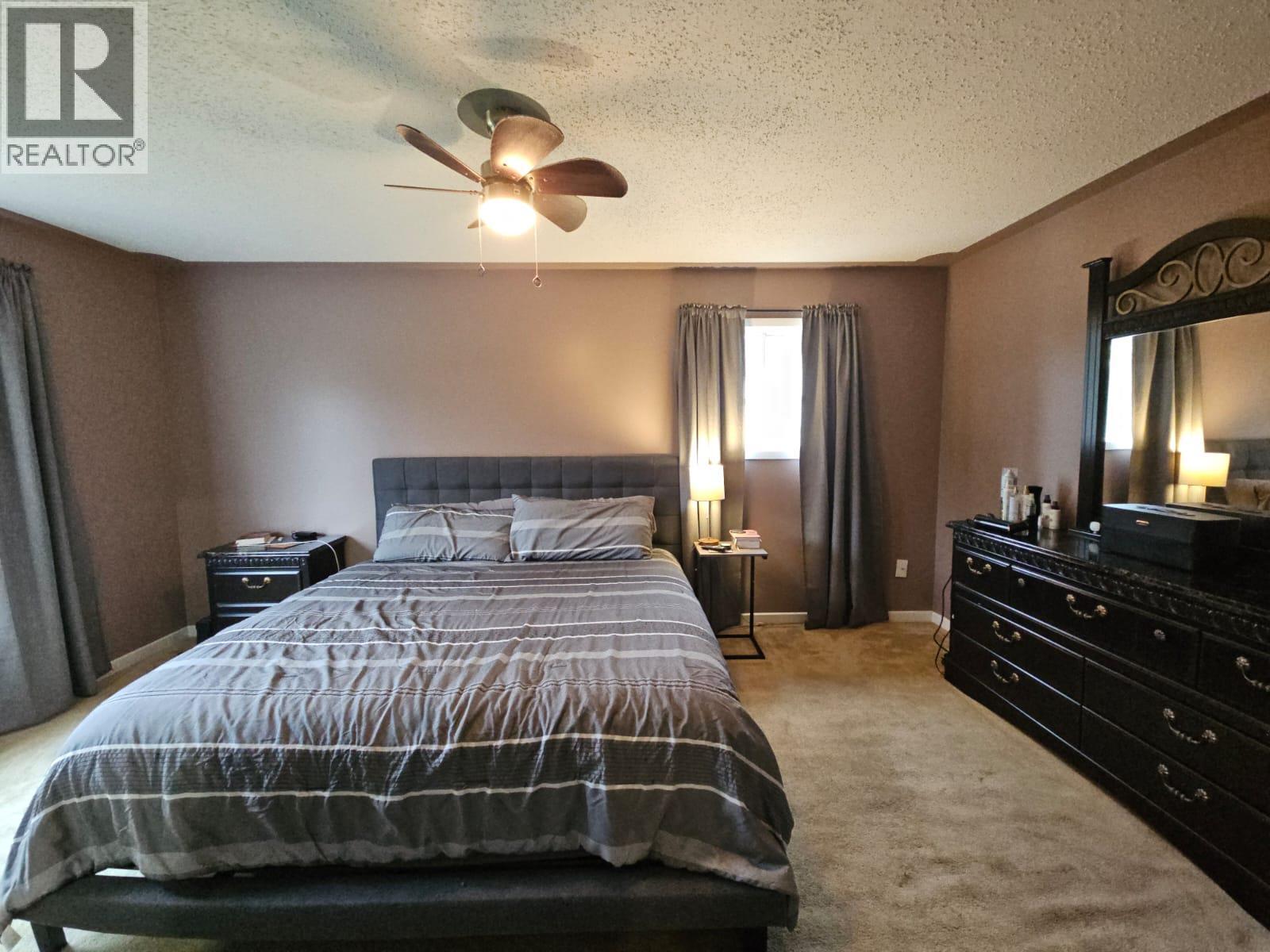 8 Sentinal Place, Tumbler Ridge, BC - Indoor Photo Showing Bedroom