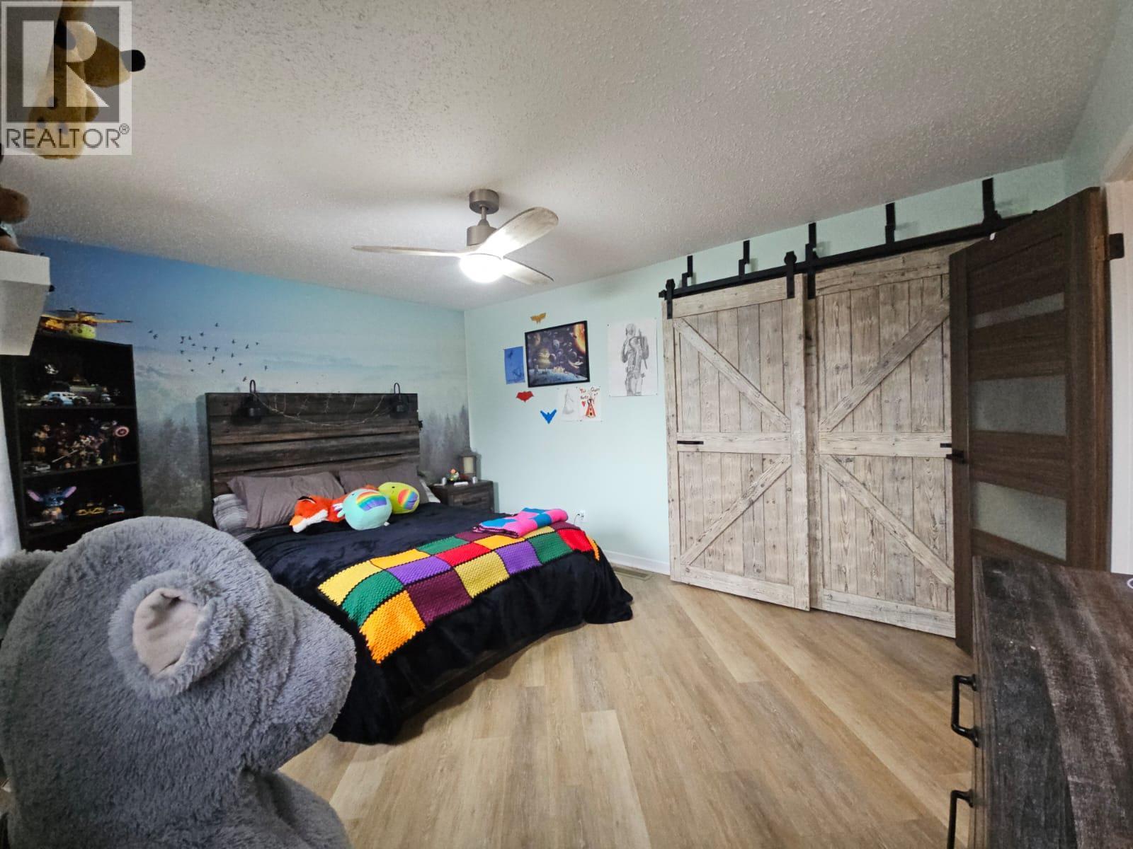 8 Sentinal Place, Tumbler Ridge, BC - Indoor Photo Showing Bedroom