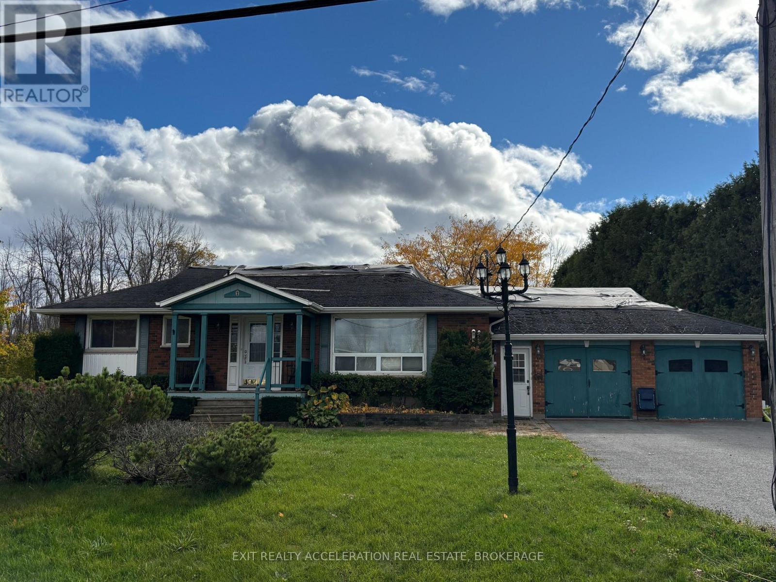 7 Main Street, Loyalist (Odessa), ON - Outdoor With Deck Patio Veranda With Facade