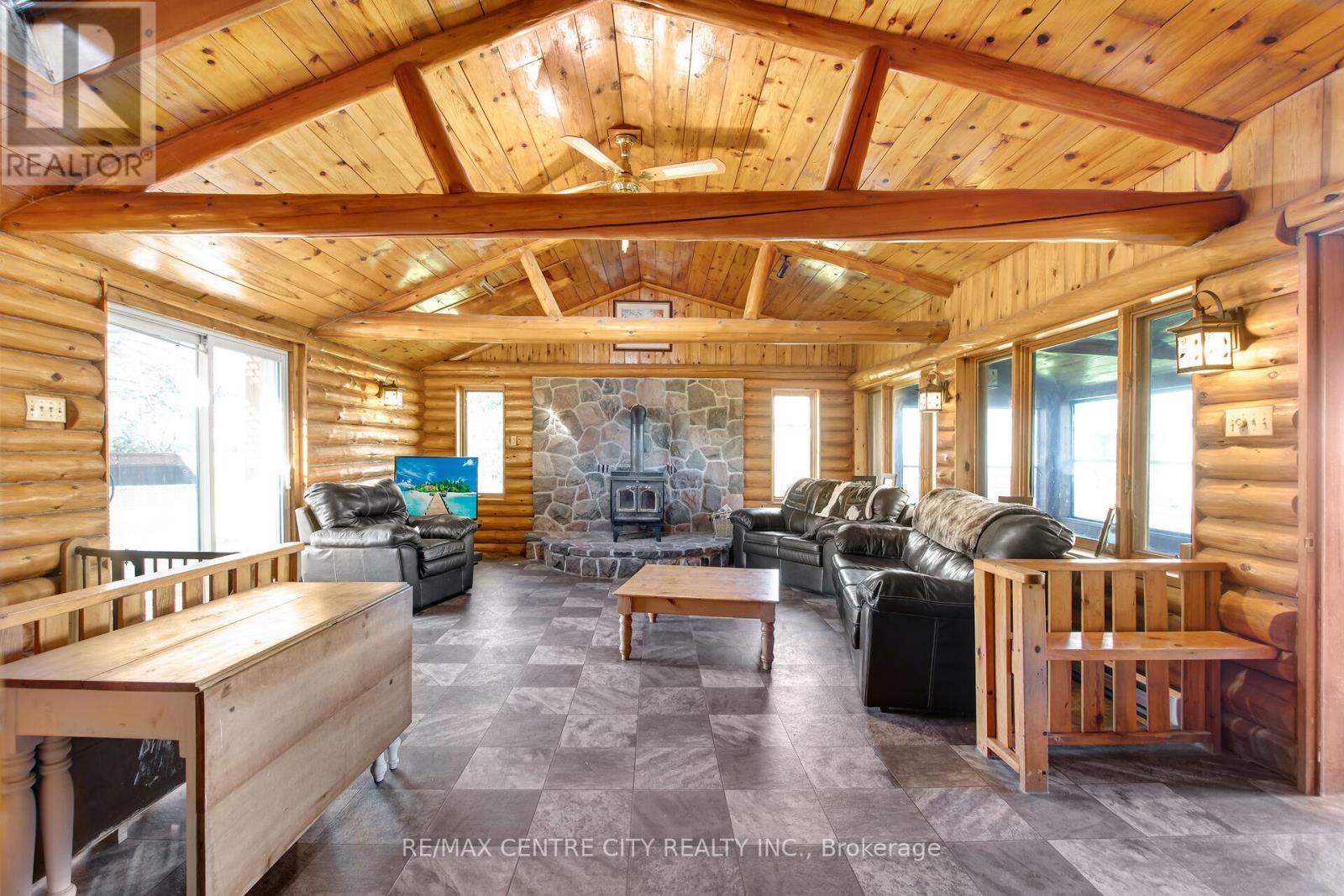 1048 Fifth Line, Selwyn, ON - Indoor With Fireplace