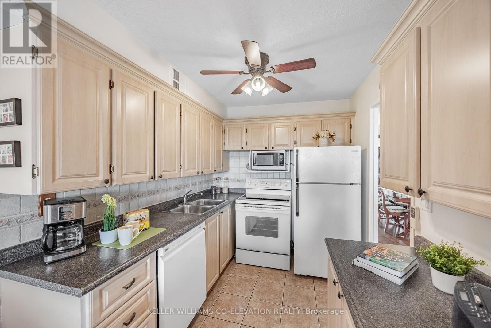 Super Efficient Updated Kitchen - 1306 - 260 Scarlett Road, Toronto, ON - Indoor Photo Showing Kitchen With Double Sink
