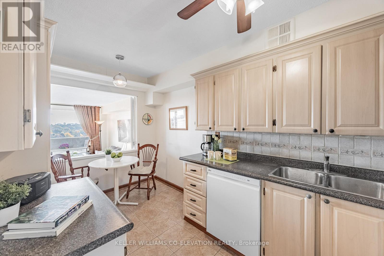 Full White Appliance Package - 1306 - 260 Scarlett Road, Toronto, ON - Indoor Photo Showing Kitchen With Double Sink