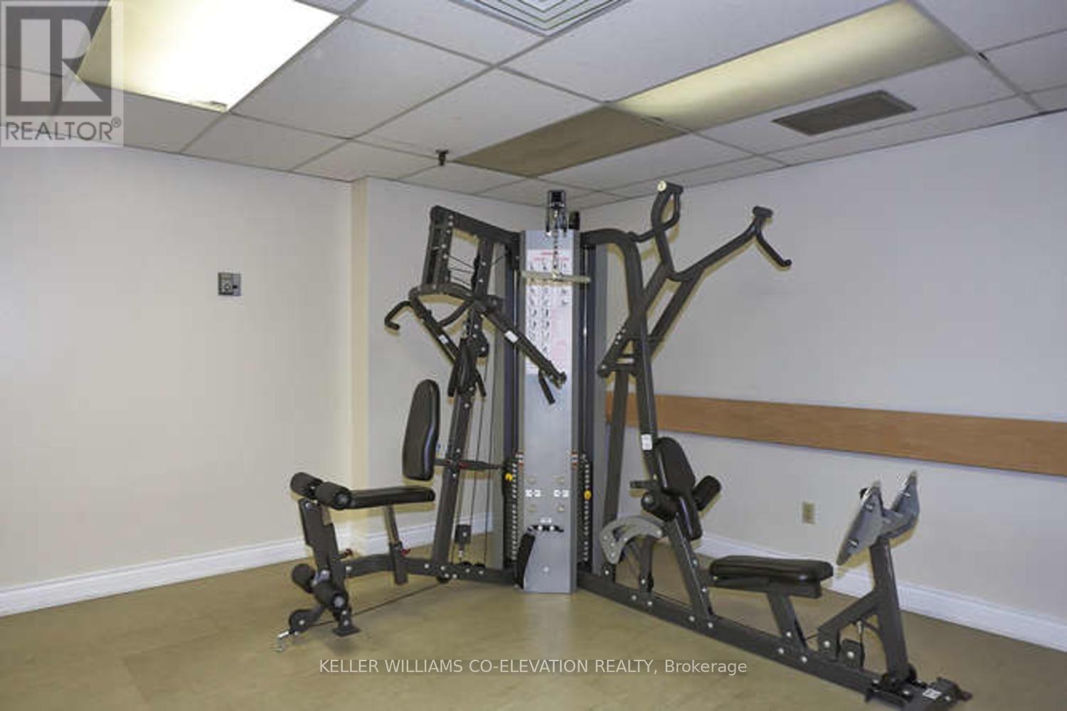 Pump Some Iron! - 1306 - 260 Scarlett Road, Toronto, ON - Indoor Photo Showing Gym Room