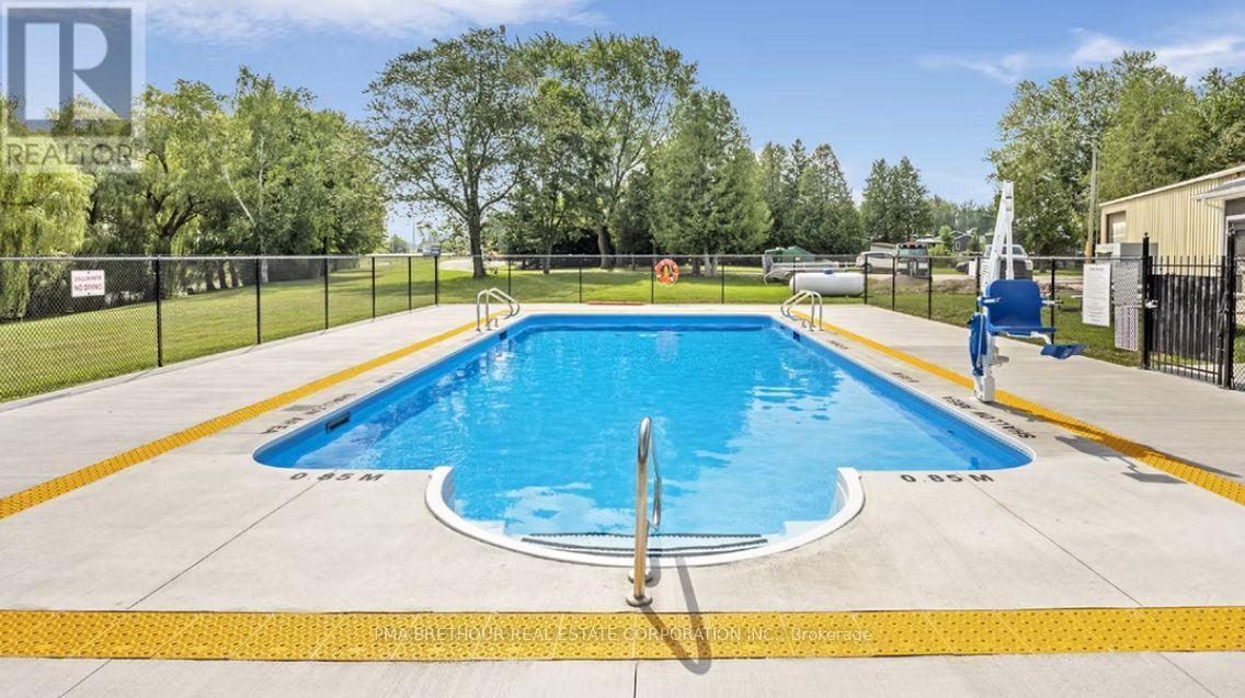21 Bluffs View Boulevard, Ashfield-Colborne-Wawanosh, ON - Outdoor With In Ground Pool With Backyard