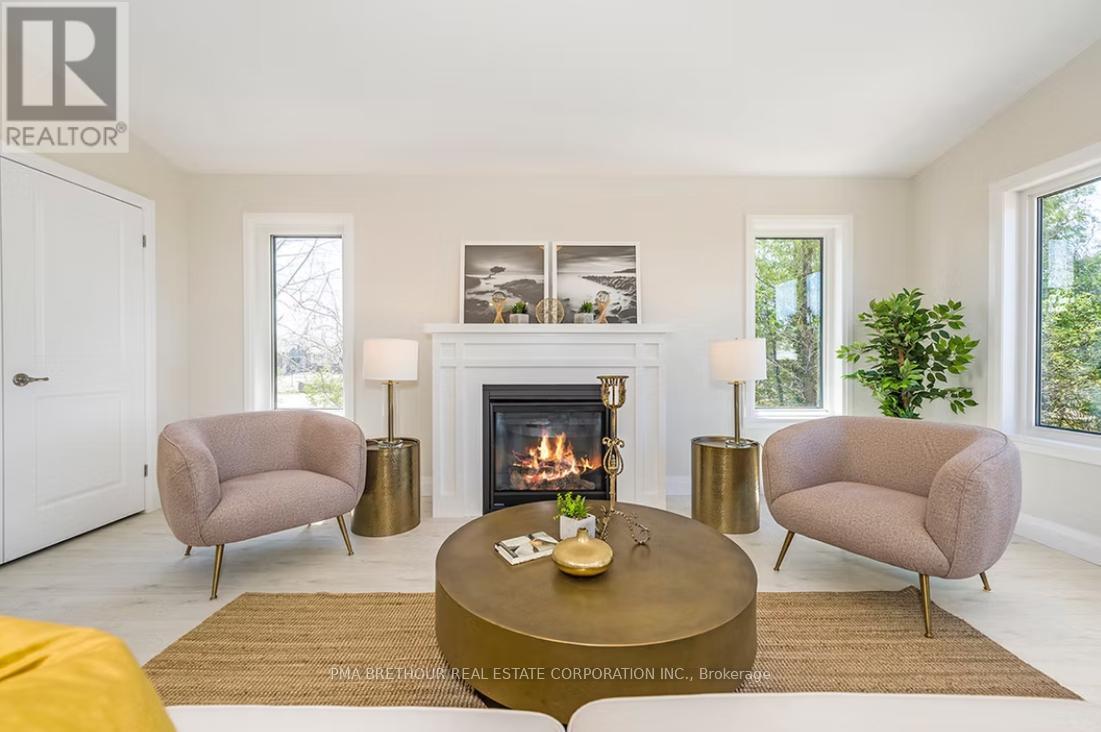 21 Bluffs View Boulevard, Ashfield-Colborne-Wawanosh, ON - Indoor Photo Showing Living Room With Fireplace