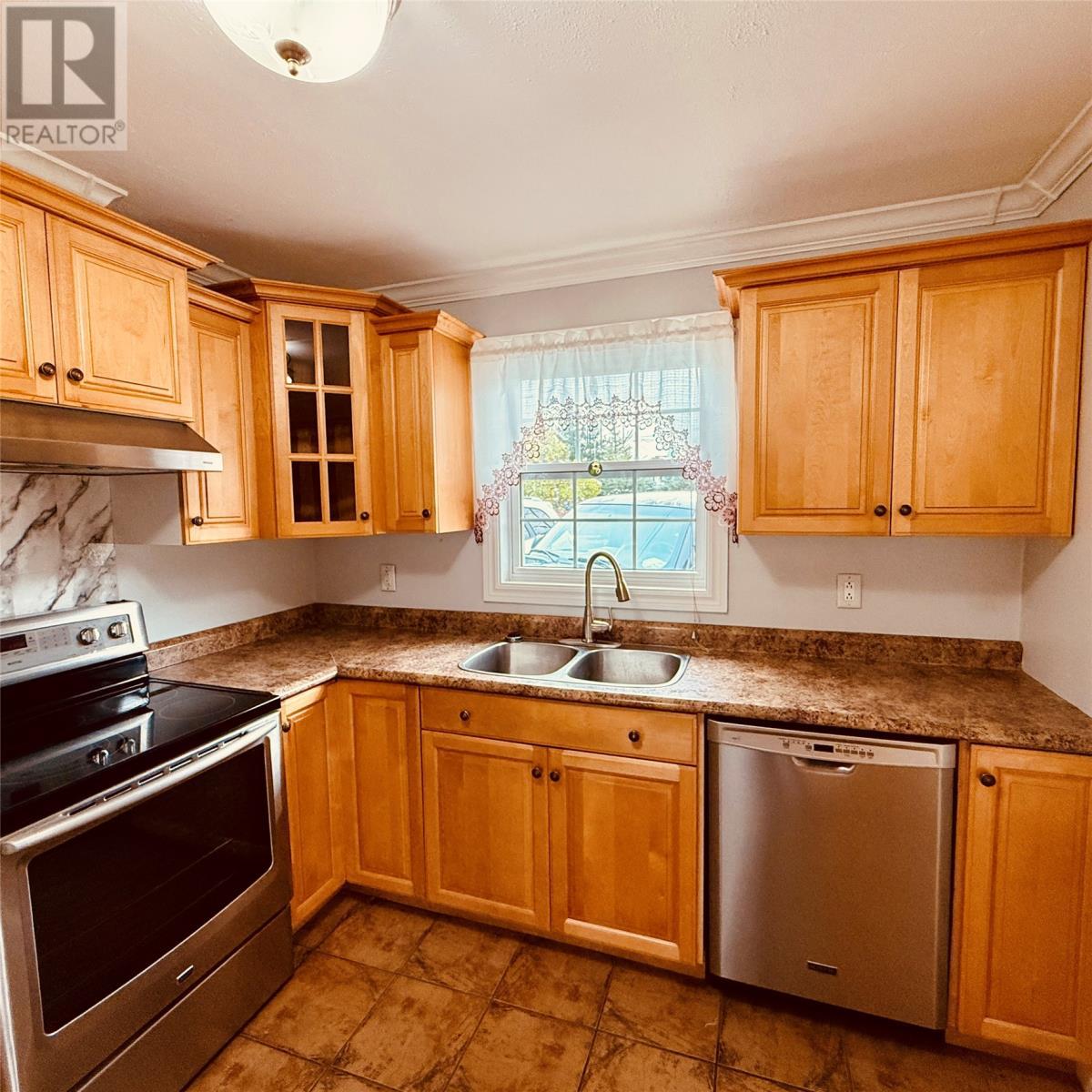 4 Scout Road, Botwood, NL - Indoor Photo Showing Kitchen With Double Sink