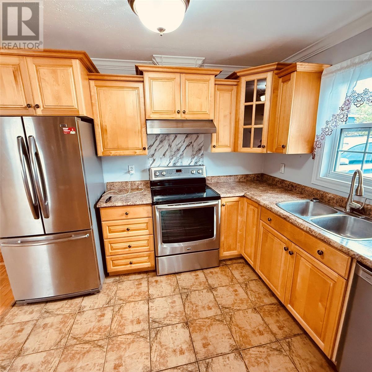 4 Scout Road, Botwood, NL - Indoor Photo Showing Kitchen With Double Sink
