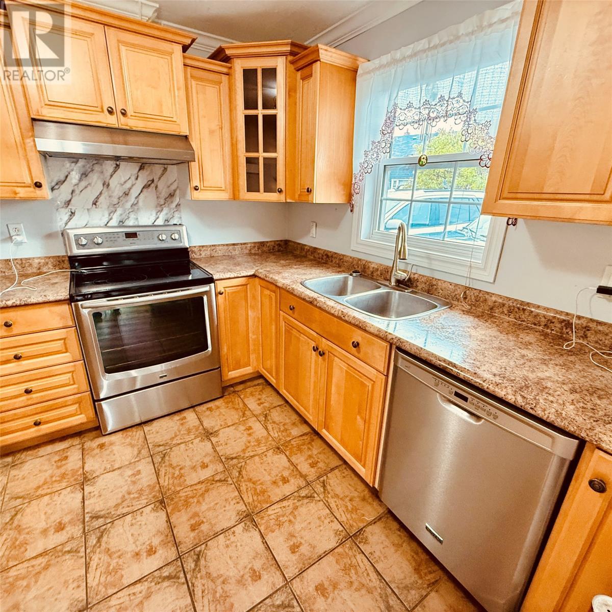 4 Scout Road, Botwood, NL - Indoor Photo Showing Kitchen With Stainless Steel Kitchen With Double Sink