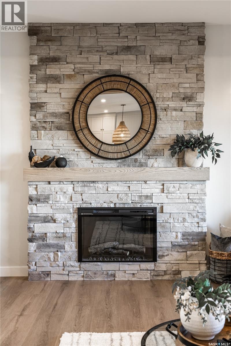 415 Sharma Crescent, Saskatoon, SK - Indoor Photo Showing Living Room With Fireplace