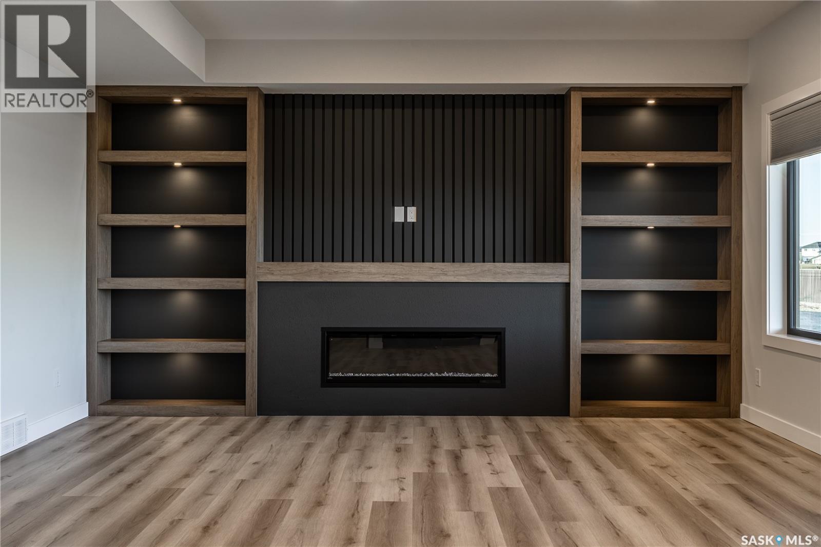 415 Sharma Crescent, Saskatoon, SK - Indoor Photo Showing Living Room With Fireplace