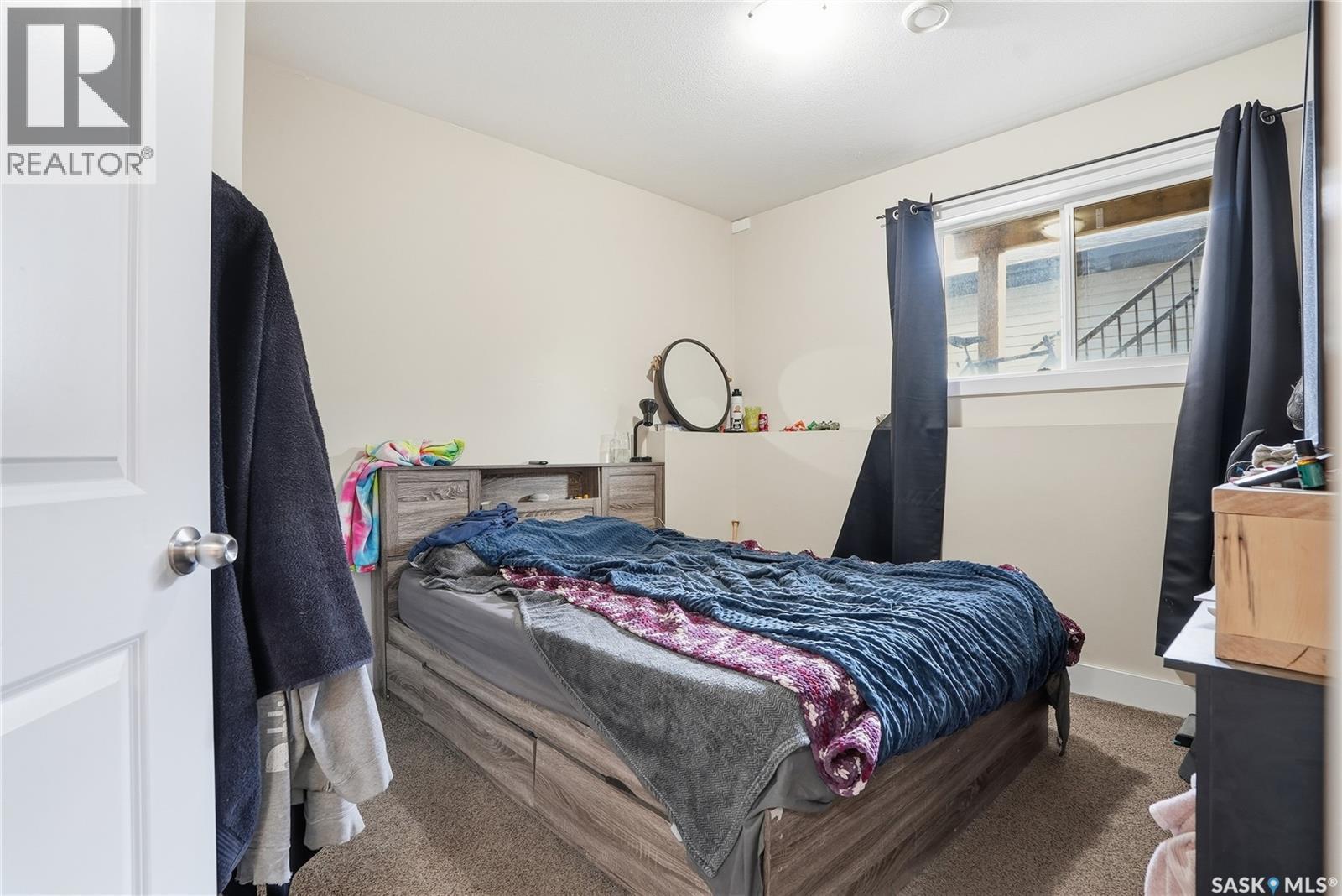 5 29 1St Avenue N, Martensville, SK - Indoor Photo Showing Bedroom
