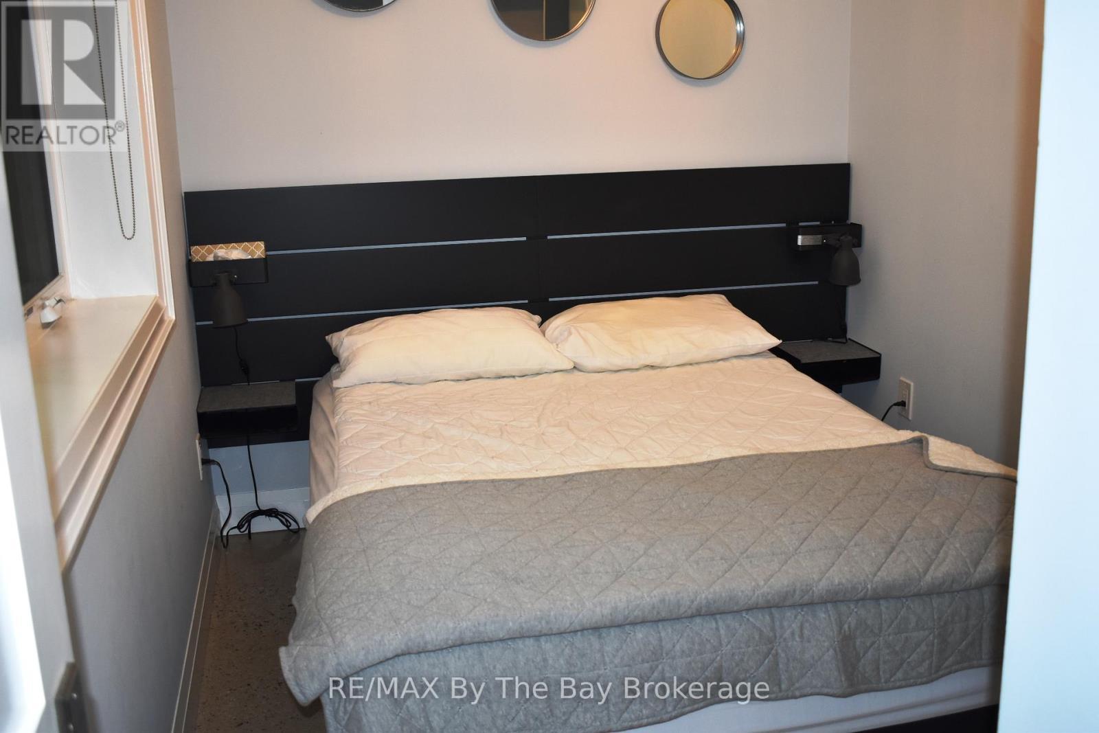 #1 - 1054 Lawson Road, Tiny, ON - Indoor Photo Showing Bedroom