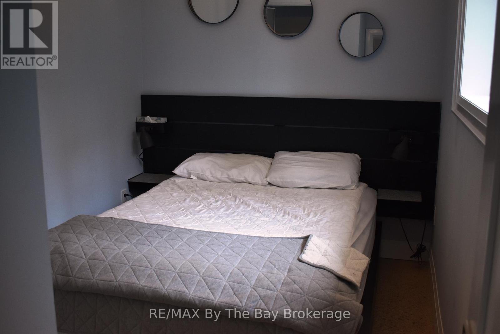 #1 - 1054 Lawson Road, Tiny, ON - Indoor Photo Showing Bedroom