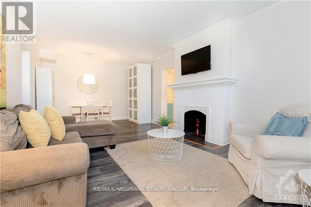 1A - 180 Augusta Street, Ottawa, ON - Indoor Photo Showing Living Room With Fireplace