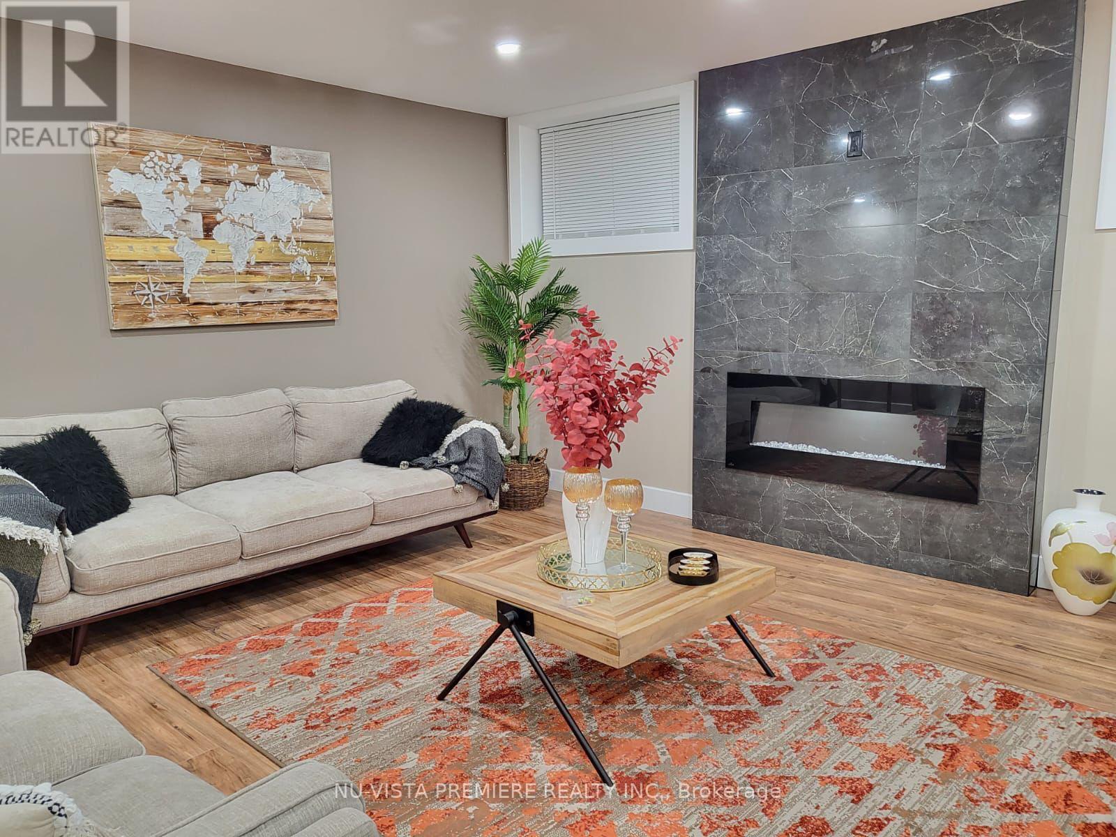 Lower Level - 1807 Brunson Way, London South (South K), ON - Indoor Photo Showing Living Room With Fireplace