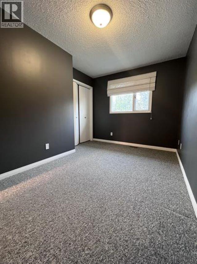 74 5550 Simpson Trail, Fort Nelson, BC - Indoor Photo Showing Other Room