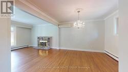 Wood Fireplace in Family room -