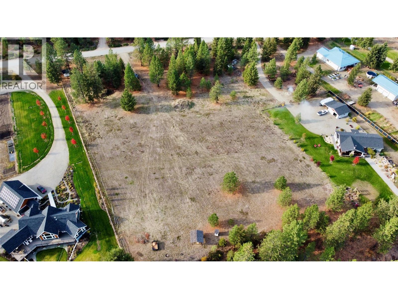 Lots 7 & 8 looking NW (lots are equal size, property line bisects the field) - 1308 Bonavista Road, Christina Lake, BC