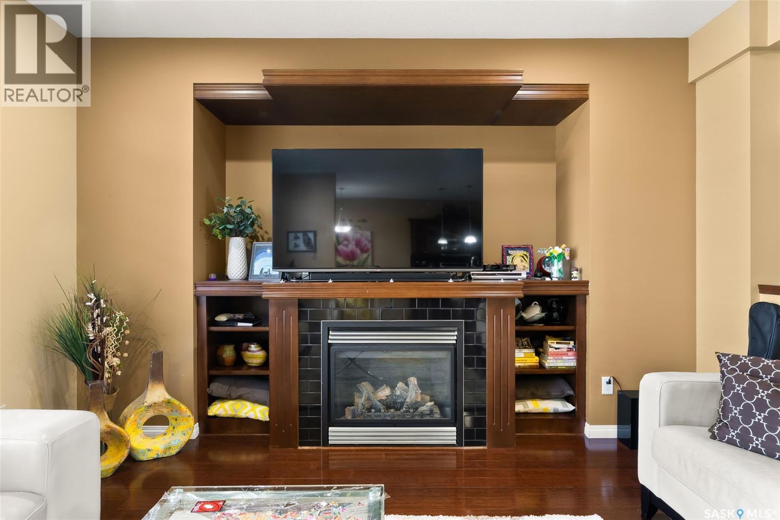 4638 Hames Crescent, Regina, SK - Indoor Photo Showing Living Room With Fireplace