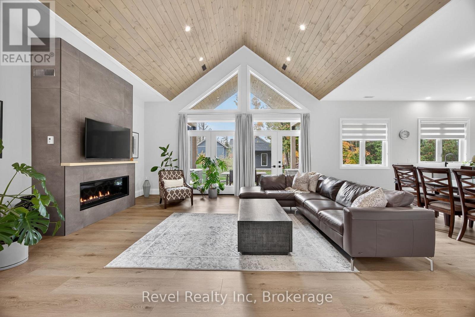 2 Seguin Crescent, Tiny, ON - Indoor Photo Showing Living Room With Fireplace