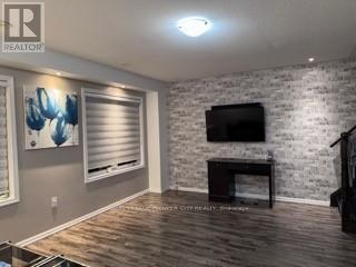 8 Vanhorne Close, Brampton, ON - Indoor Photo Showing Living Room With Fireplace