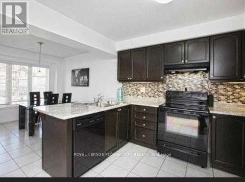 8 Vanhorne Close, Brampton, ON - Indoor Photo Showing Kitchen With Double Sink