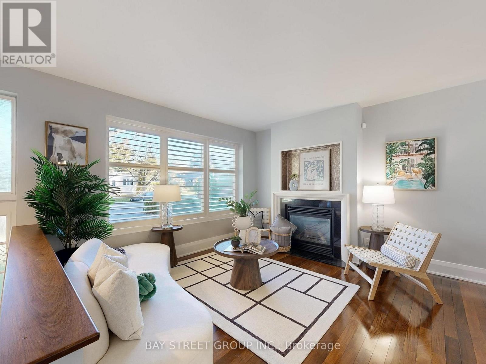 8 Overton Crescent, Toronto, ON - Indoor Photo Showing Living Room With Fireplace