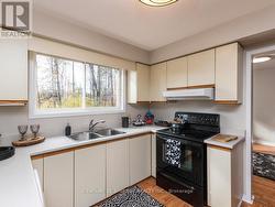 Tons of cabinetry and plenty of counter space. -