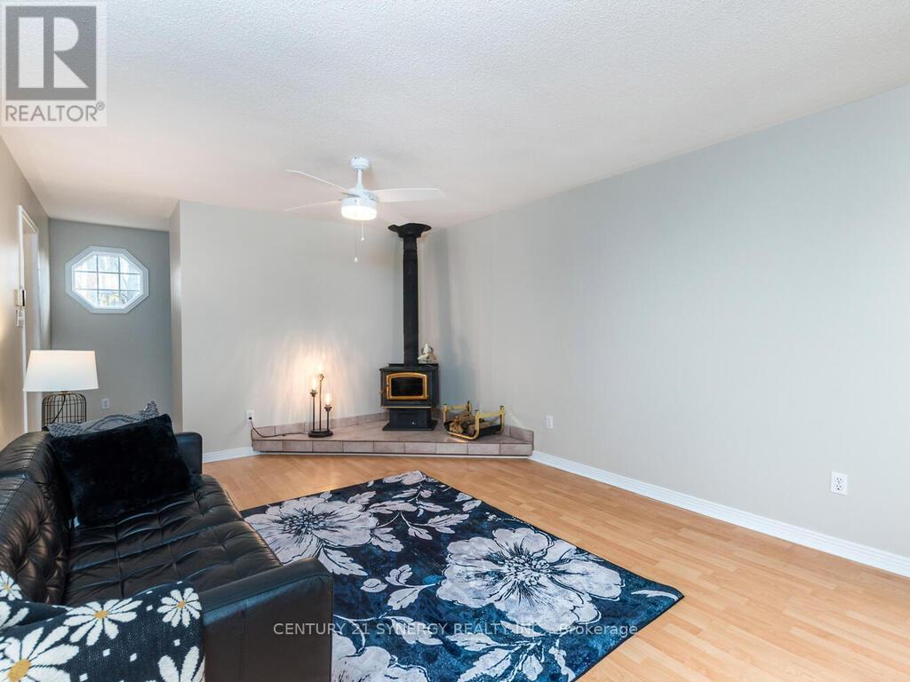 Main Floor Family room with wood stove. - 1423 Diamondview Road, Ottawa, ON - Indoor Photo Showing Living Room With Fireplace
