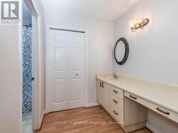 Primary Bedroom open vanity area & closet space. -