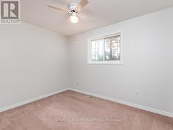 Bedroom 3 facing backyard. -