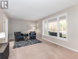 Very spacious living room with big picture window. -