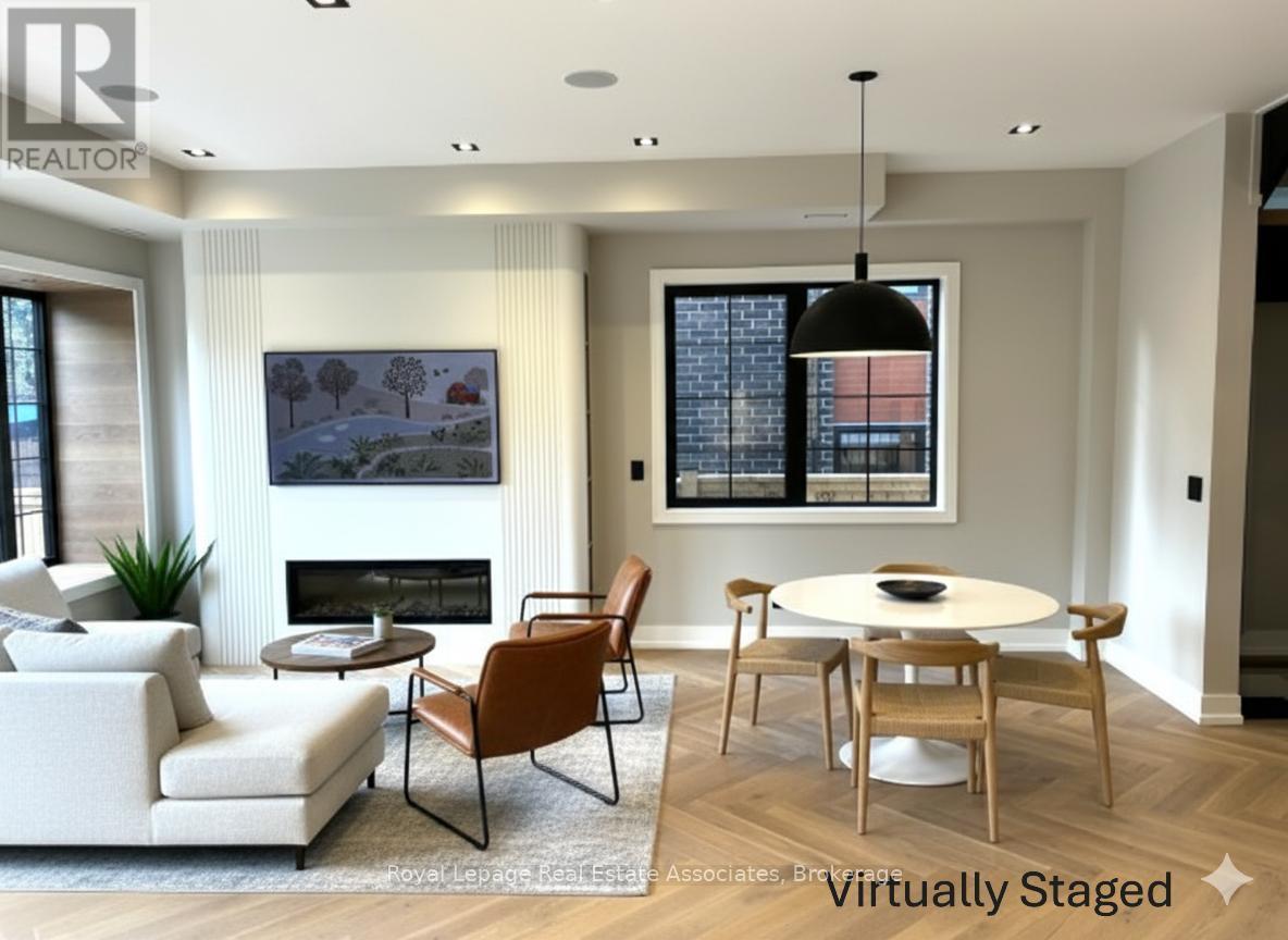 Living and Dining - 1006 Garrard Avenue, Mississauga, ON - Indoor Photo Showing Other Room With Fireplace