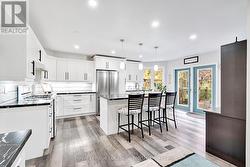 Kitchen w/ Back Deck Walk Out -