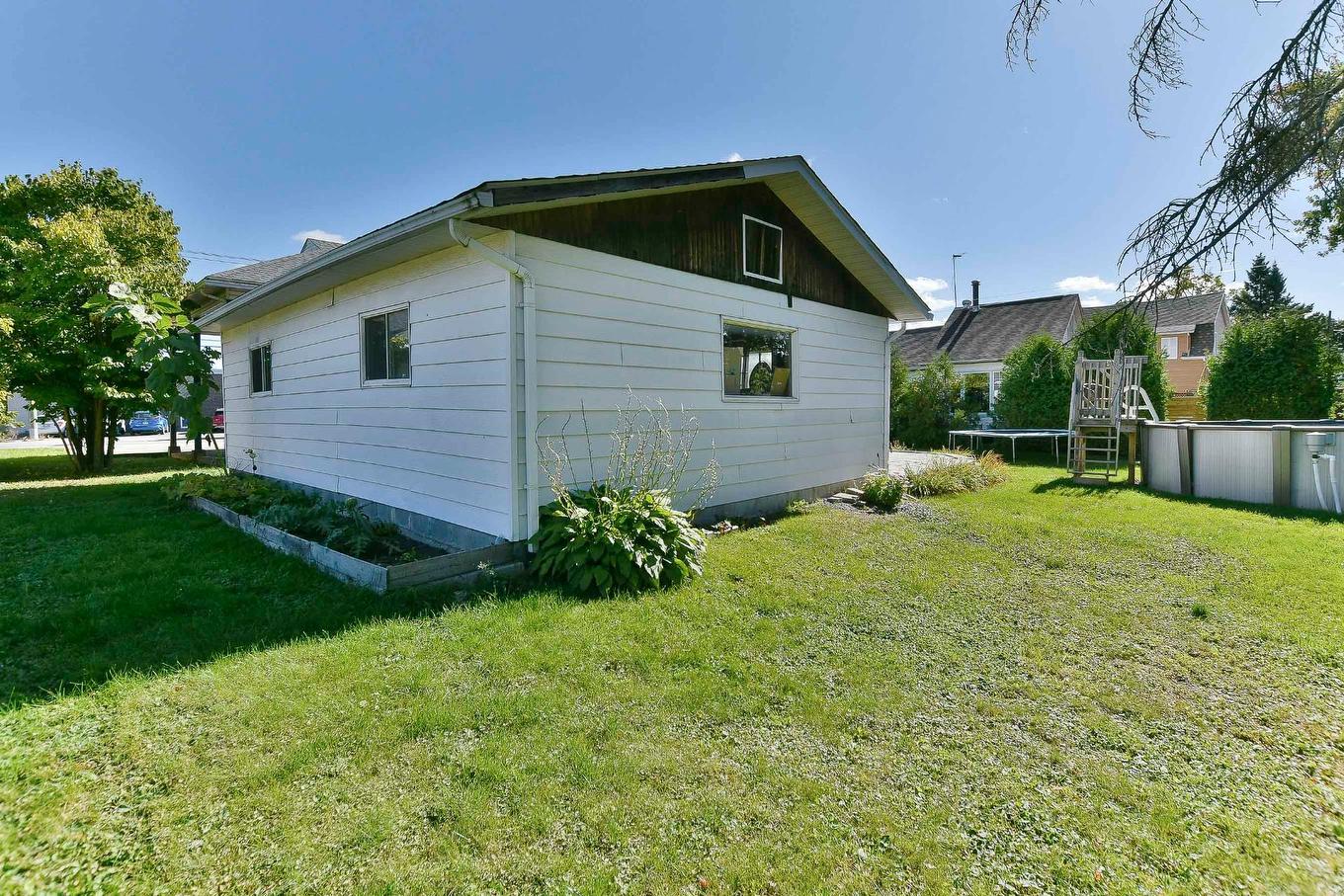 Back facade - 84 Rue Onulphe-Peltier, L'Épiphanie, QC - Outdoor With Exterior