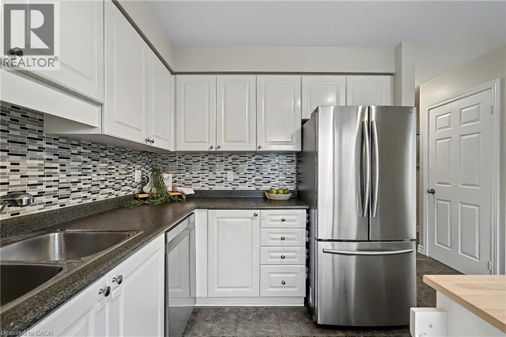 147 General Drive, Kitchener, ON - Indoor Photo Showing Kitchen With Double Sink