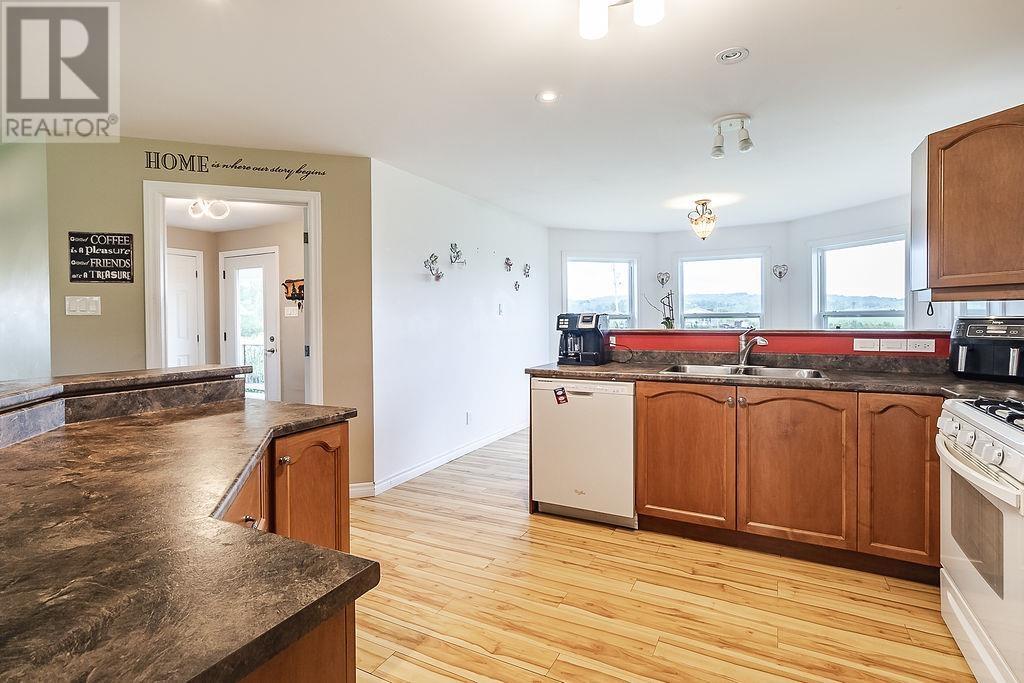 234 Echo Lake Rd, Echo Bay, ON - Indoor Photo Showing Kitchen With Double Sink